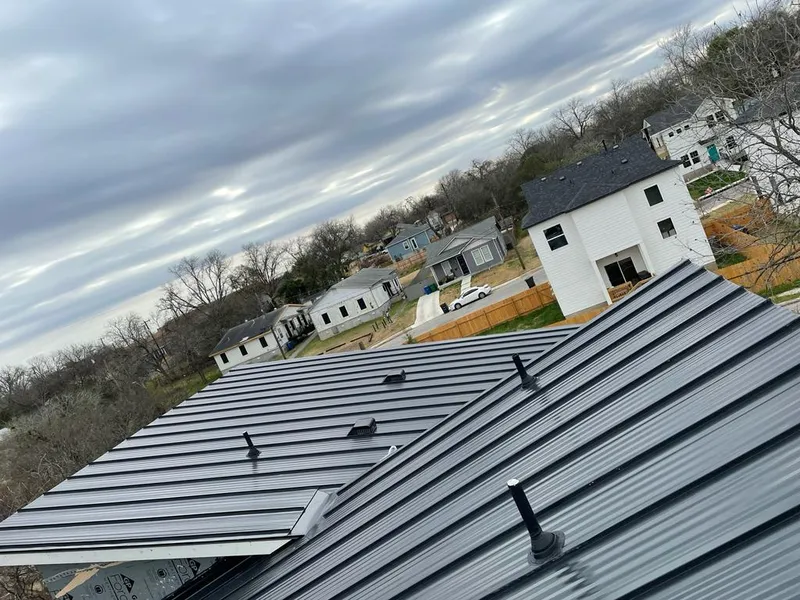 Standing seam metal roof panels with vents for Skylight Repair in Hooper